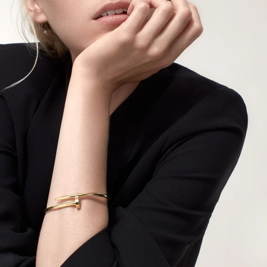PULSERA CLAVO DORADA