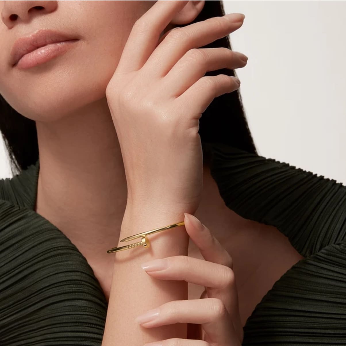 PULSERA CLAVO DELGADA DORADA
